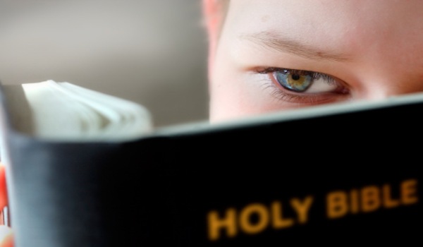 8 Profitable Ways to Read the Bible Boy reading the Bible